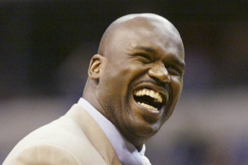 ORG XMIT: CGK722F2G4.1 Miami Heat's Shaquille O'Neal laughs during a timeout in the Heat's...