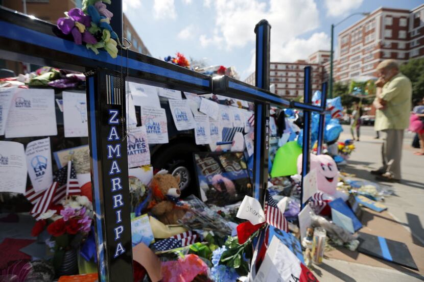 Items accumulated at a makeshift memorial in July in the days after the ambush on Dallas...