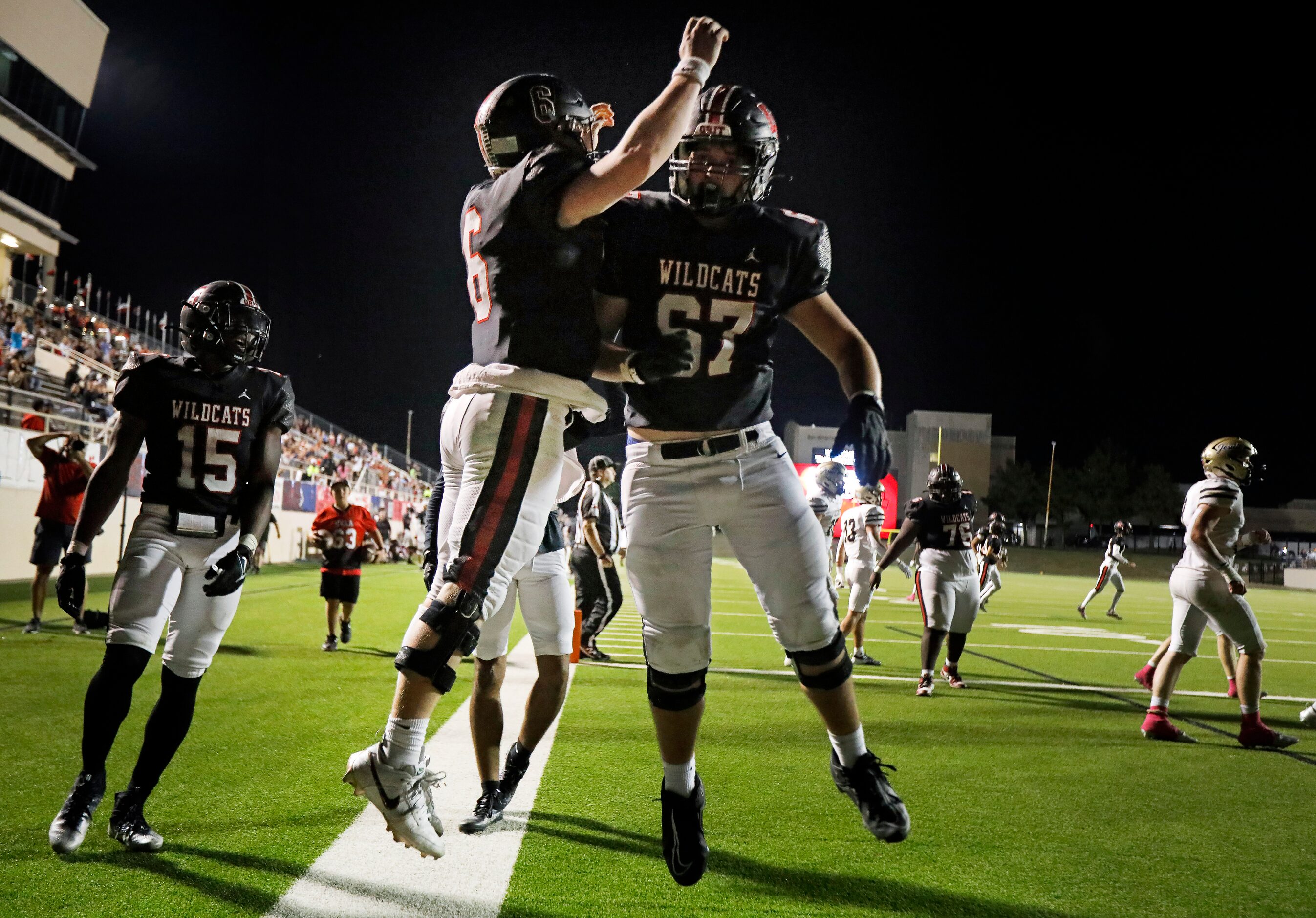 Lake Highlands High quarterback Harrison Day (6) celebrates his second half rushing...