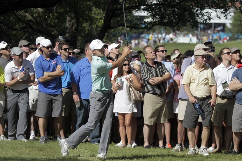 PGA golfer Jordan Spieth hits hits out of the trees on number 18 on the second day of the HP...