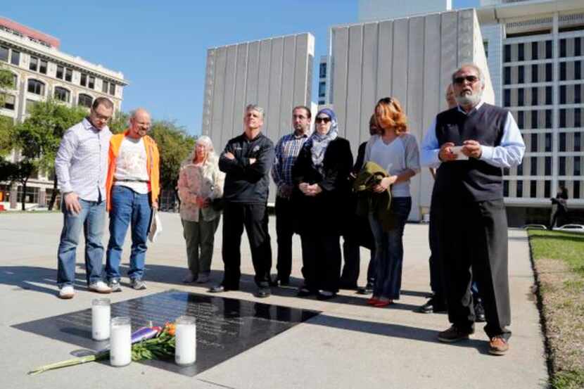 
Hadi Jawad of the Dallas Peace Center spoke Tuesday at the Kennedy Memorial during a vigil...