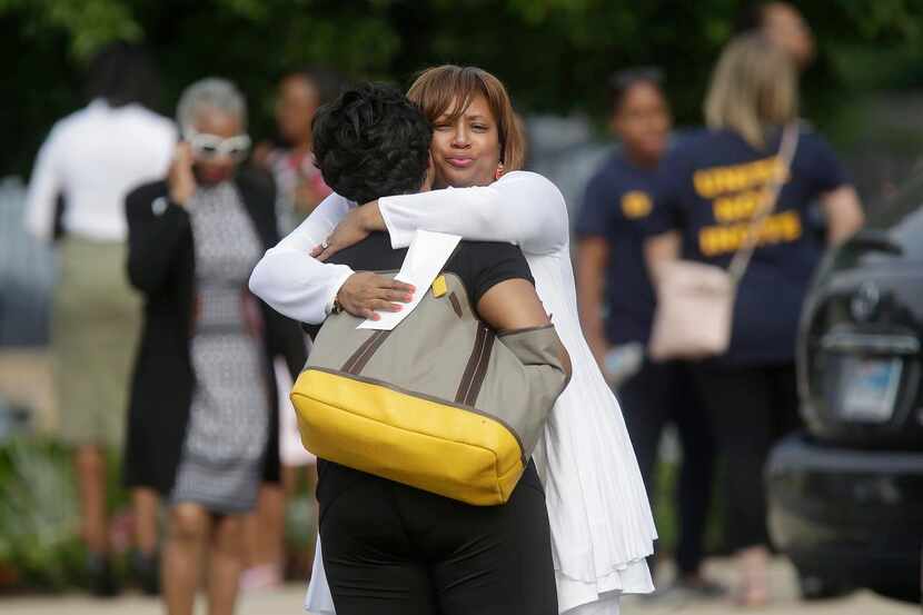 
Sharon Cooper (right), the sister of Sandra Bland, embraced a mourner at Bland’s funeral in...