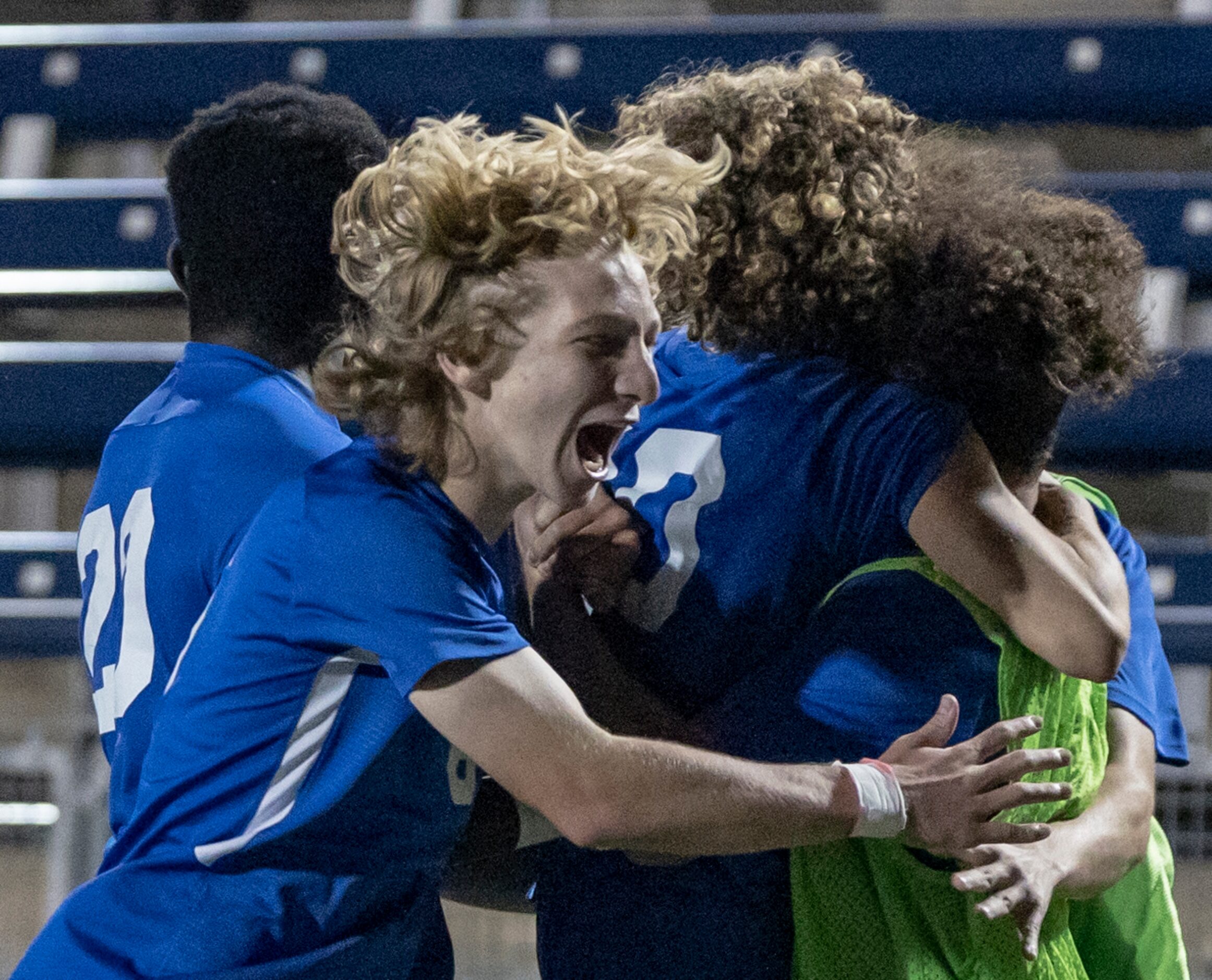 Allen High School Evan Pustejovsky celebrates with his teammates after Matthew Sanchez...