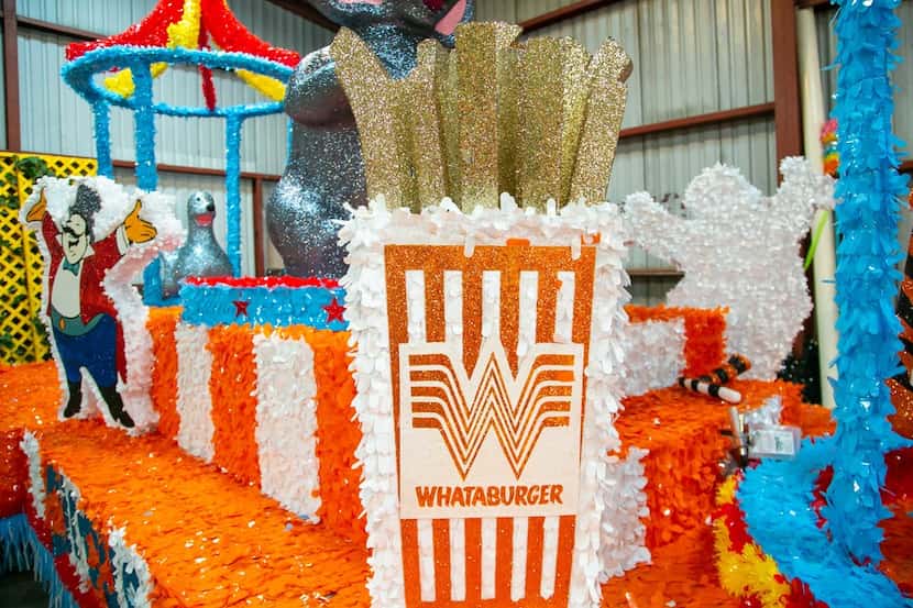The Whataburger-themed float that was part of the Battle of Flowers Parade during Fiesta San...