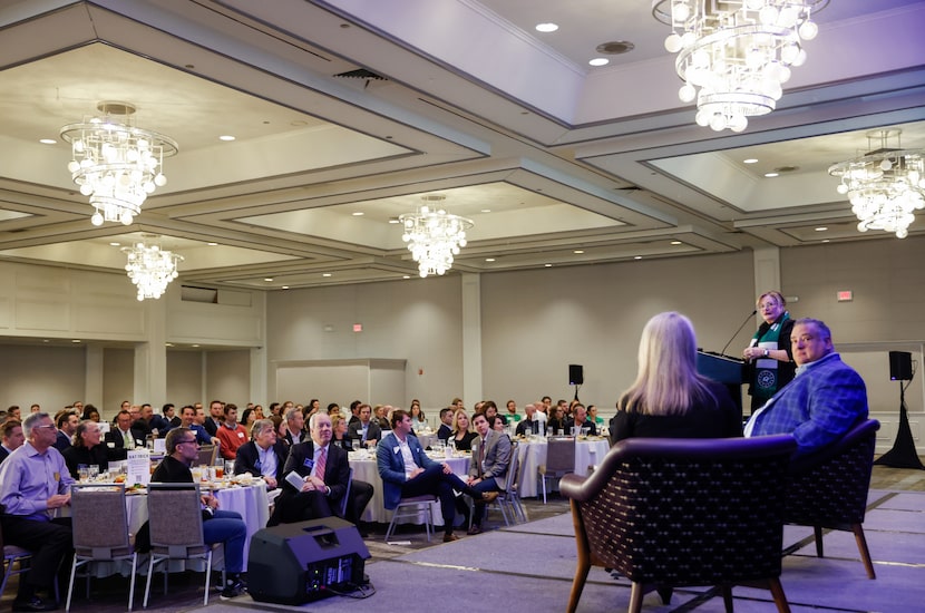 Linda McMahon (at podium), president and CEO of The Real Estate Council, gives closing...