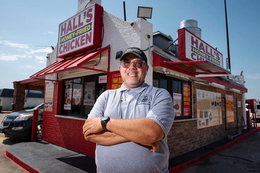 Owner John Hall outside of his reopened Hall's Honey Fried Chicken on West Camp Wisdom Road...