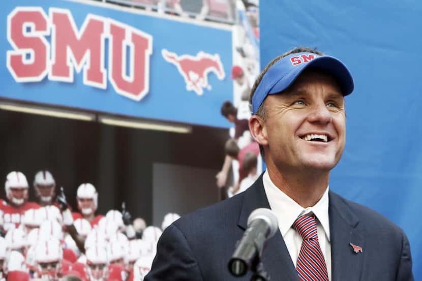 Chad Morris looks on during a press conference announcing him as SMU's new head football...