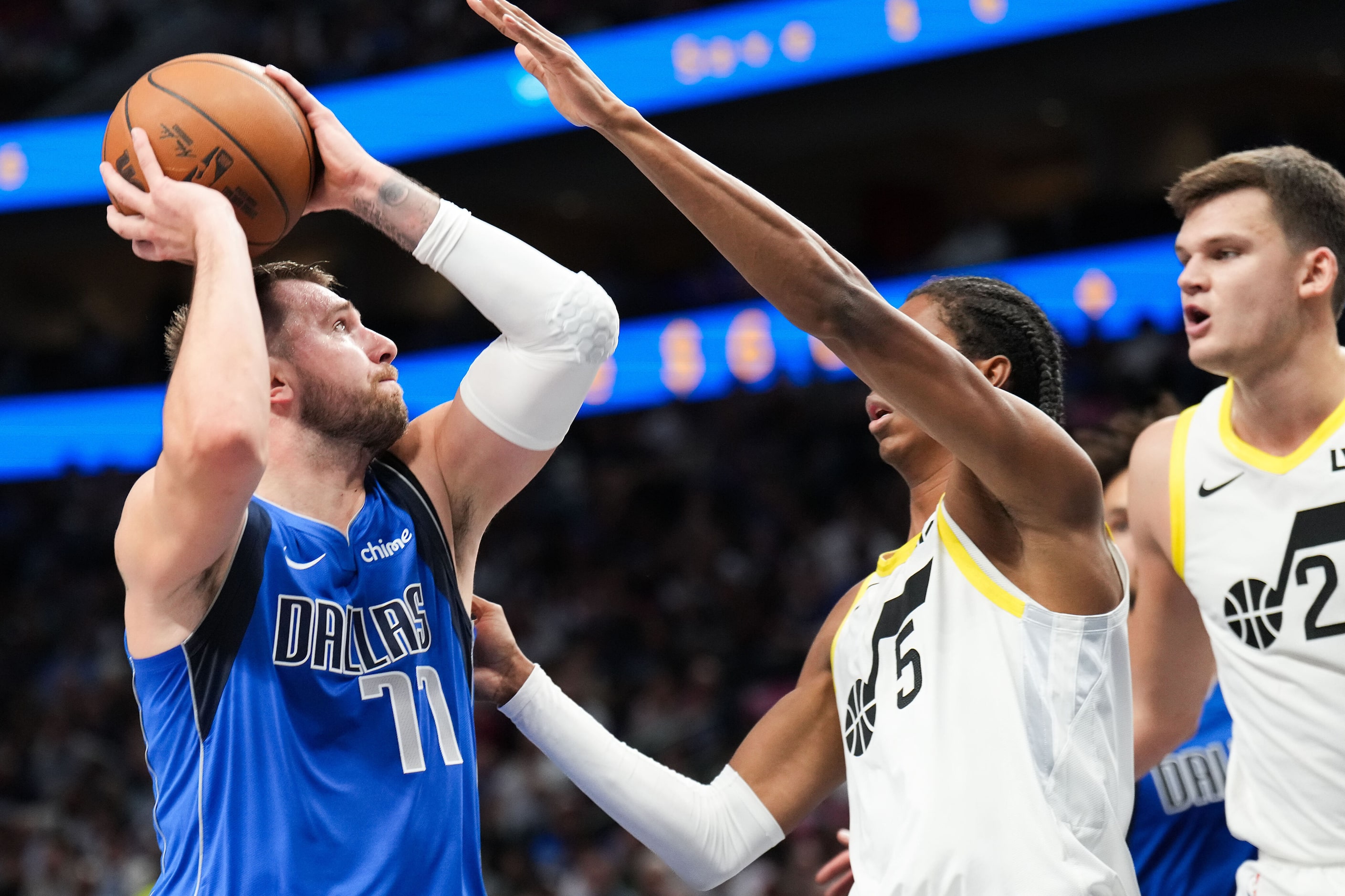 Dallas Mavericks guard Luka Doncic (77) drives against Utah Jazz forward Cody Williams (5)...