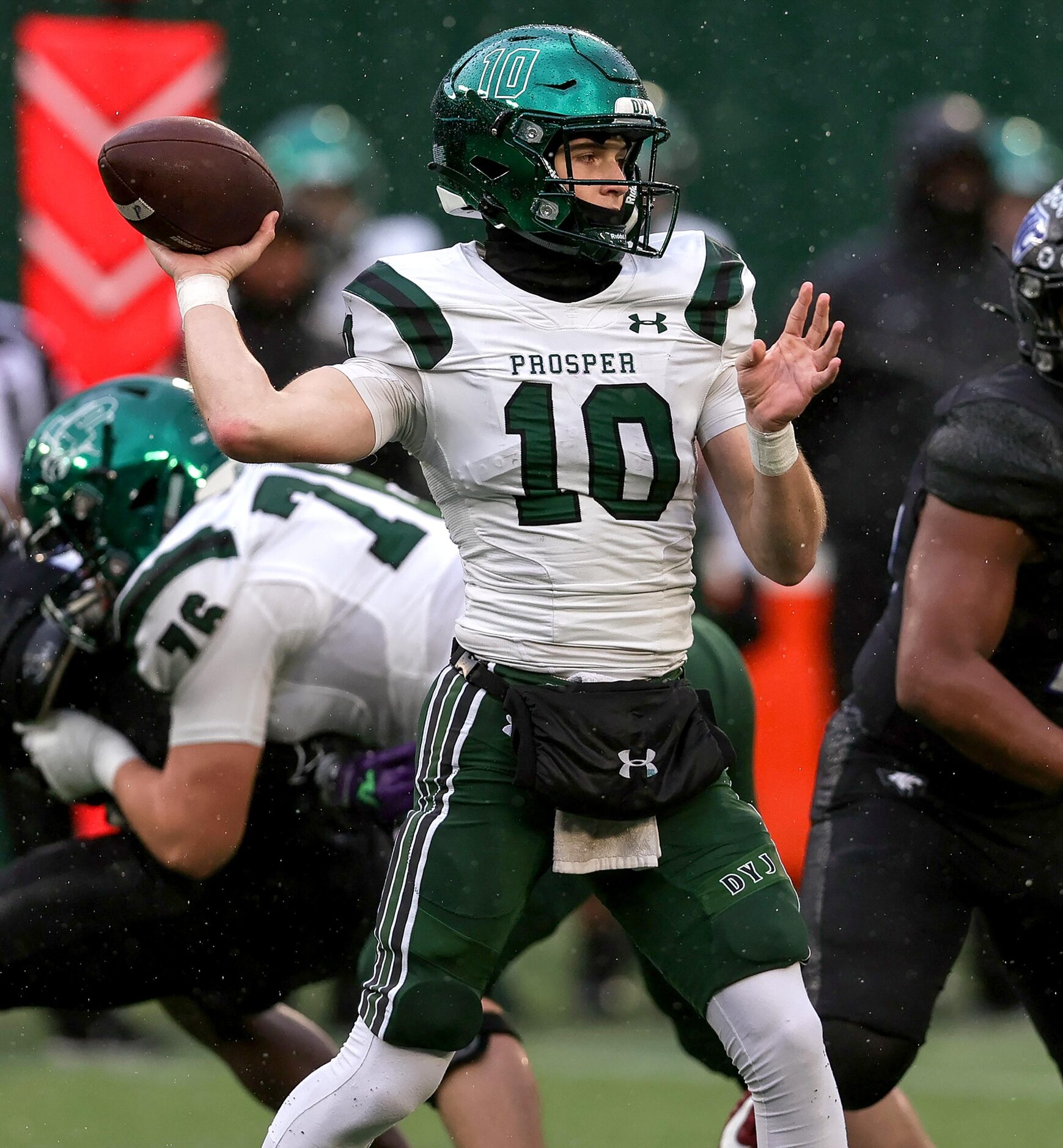 Prosper quarterback Harrison Rosar looks to pass against North Crowley during the first half...