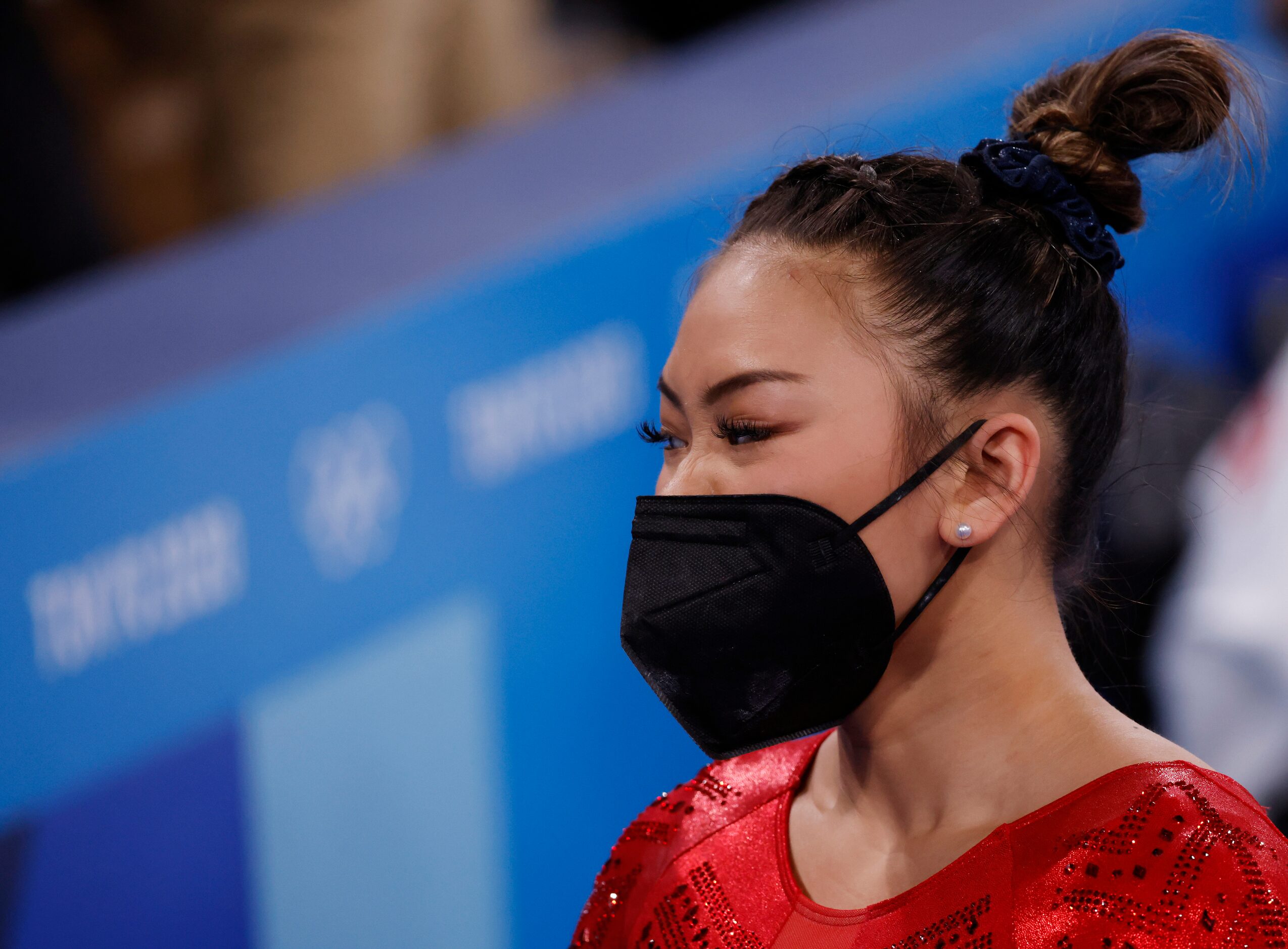 USA’s Sunisa Lee wears a mask during the artistic gymnastics women’s team final at the...