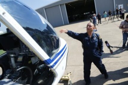  Laurent Lespagnol shows where the bird came through the windscreen. (Nathan Hunsinger/Staff...