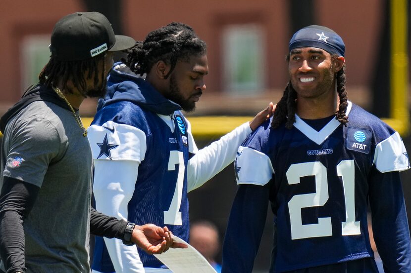 Dallas Cowboys cornerback Trevon Diggs (7) talks with defensive backs coach Al Harris and...