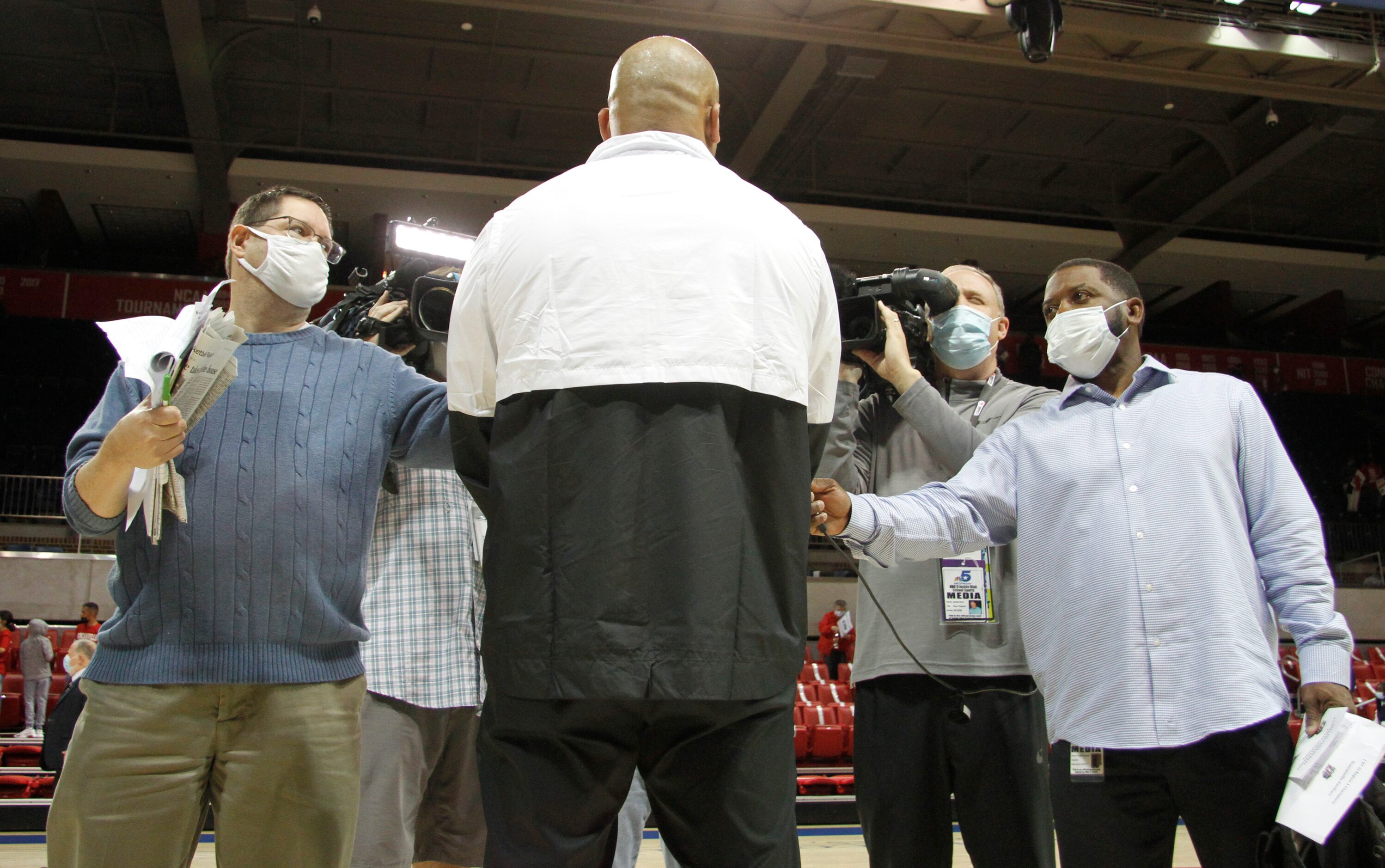 Duncanville head coach David Peavy fields questions from members of the media following...