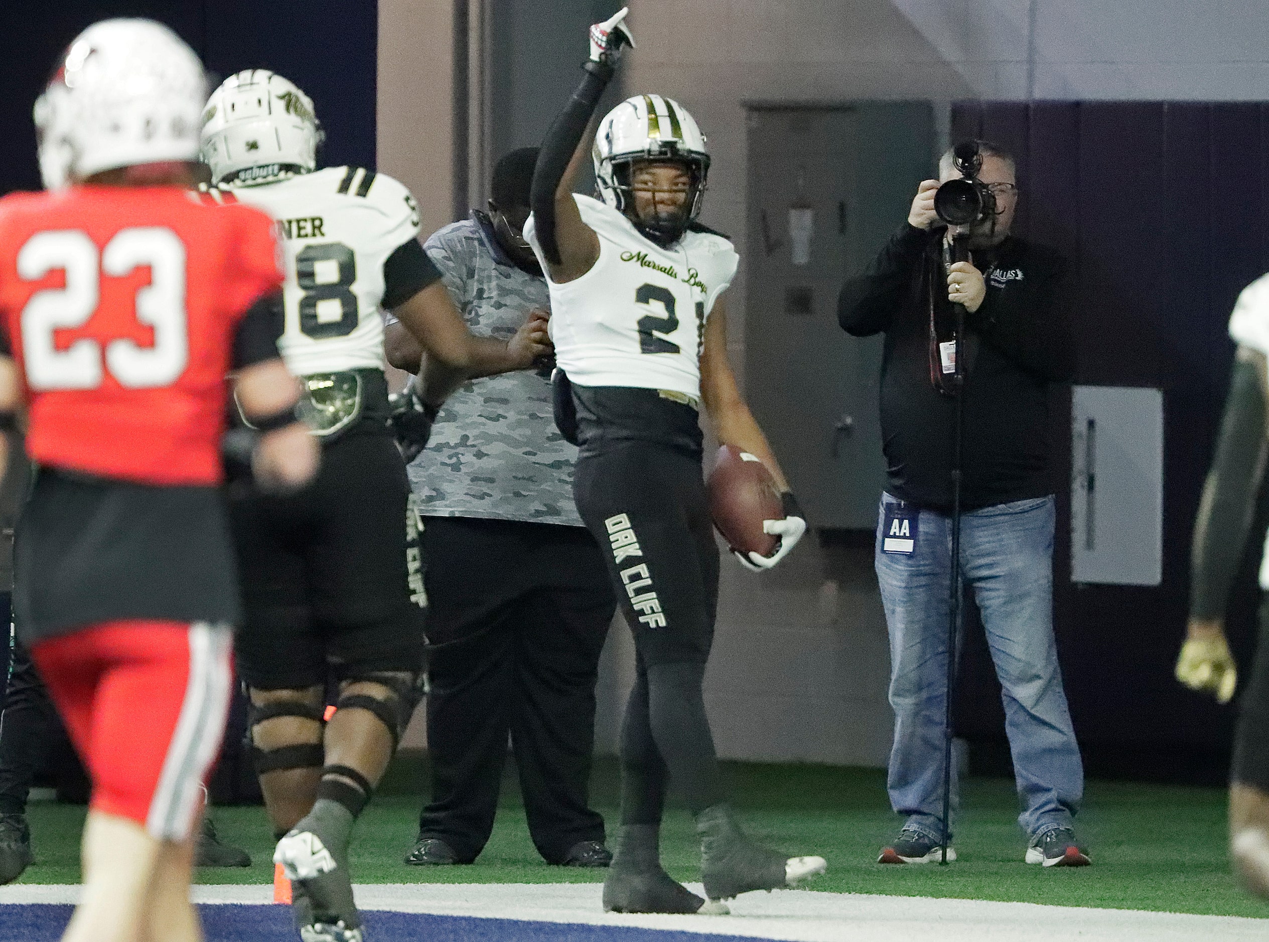 South Oak Cliff High School running back Danny Green Jr (21) celebrates after scoring the...