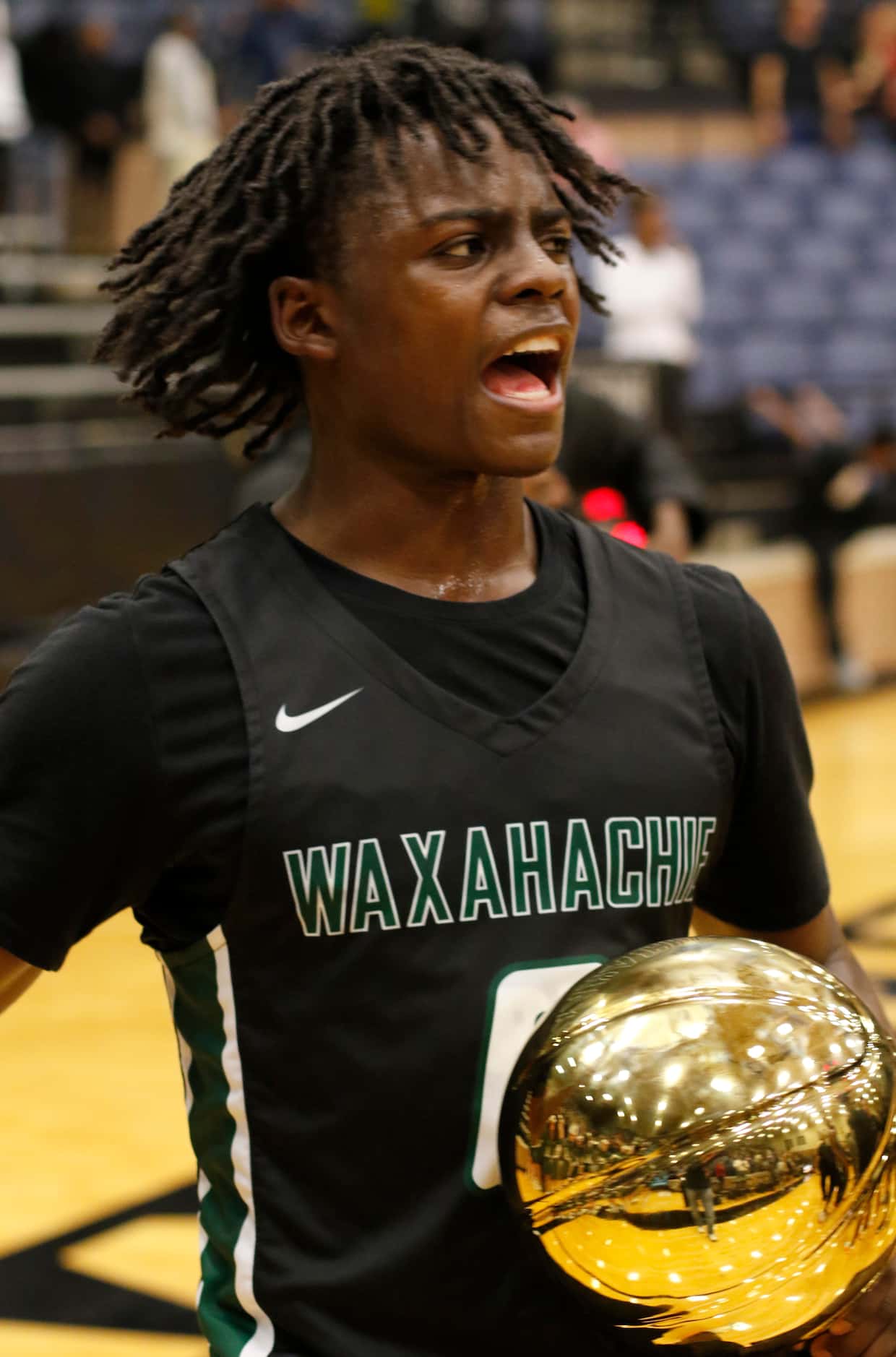 Waxahachie guard BJ Francis (0) lets out a yell following the Indians' 62-50 victory over...