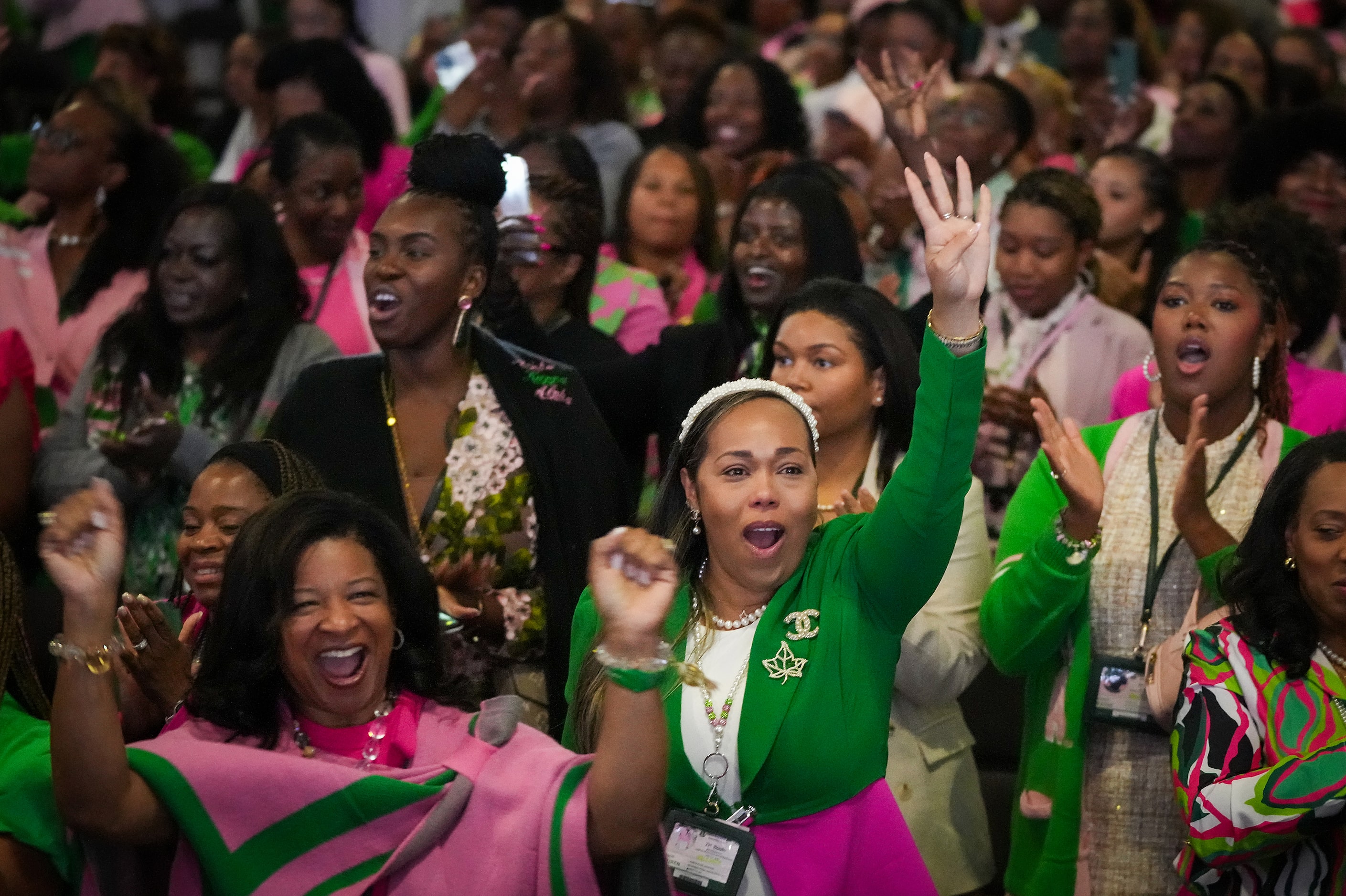 Delegates chant “Four More Years” as Vice President Kamala Harris departs the stage after...