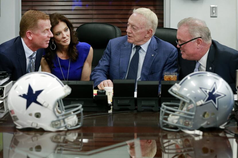 (from left) Dallas Cowboys head coach Jason Garrett, Executive Vice President and Chief...