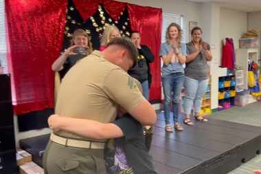 In this video screenshot, U.S. Marine Isaac Ballard surprises his younger brother at...