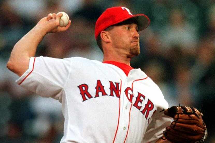 ORG XMIT:  Rangers pitcher Bobby Witt closes the first inning with a strikeout against...
