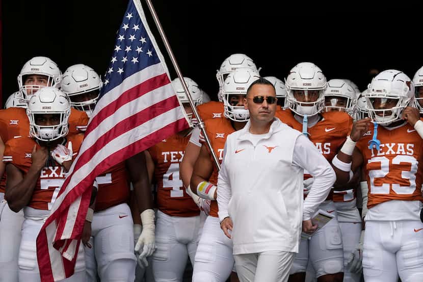 Texas head coach Steve Sarkisian and his team prepare to take the field for an NCAA college...