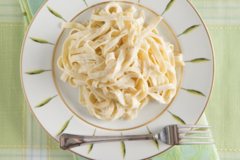 The Dallas Morning News Wine Panel on wines with Fettuccine Alfredo. Plate, tablecloth and...