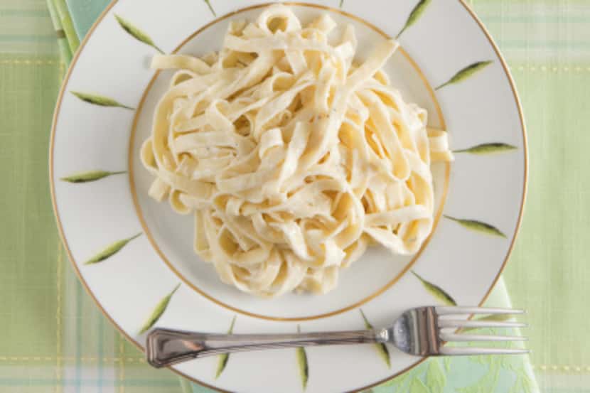 The Dallas Morning News Wine Panel on wines with Fettuccine Alfredo. Plate, tablecloth and...
