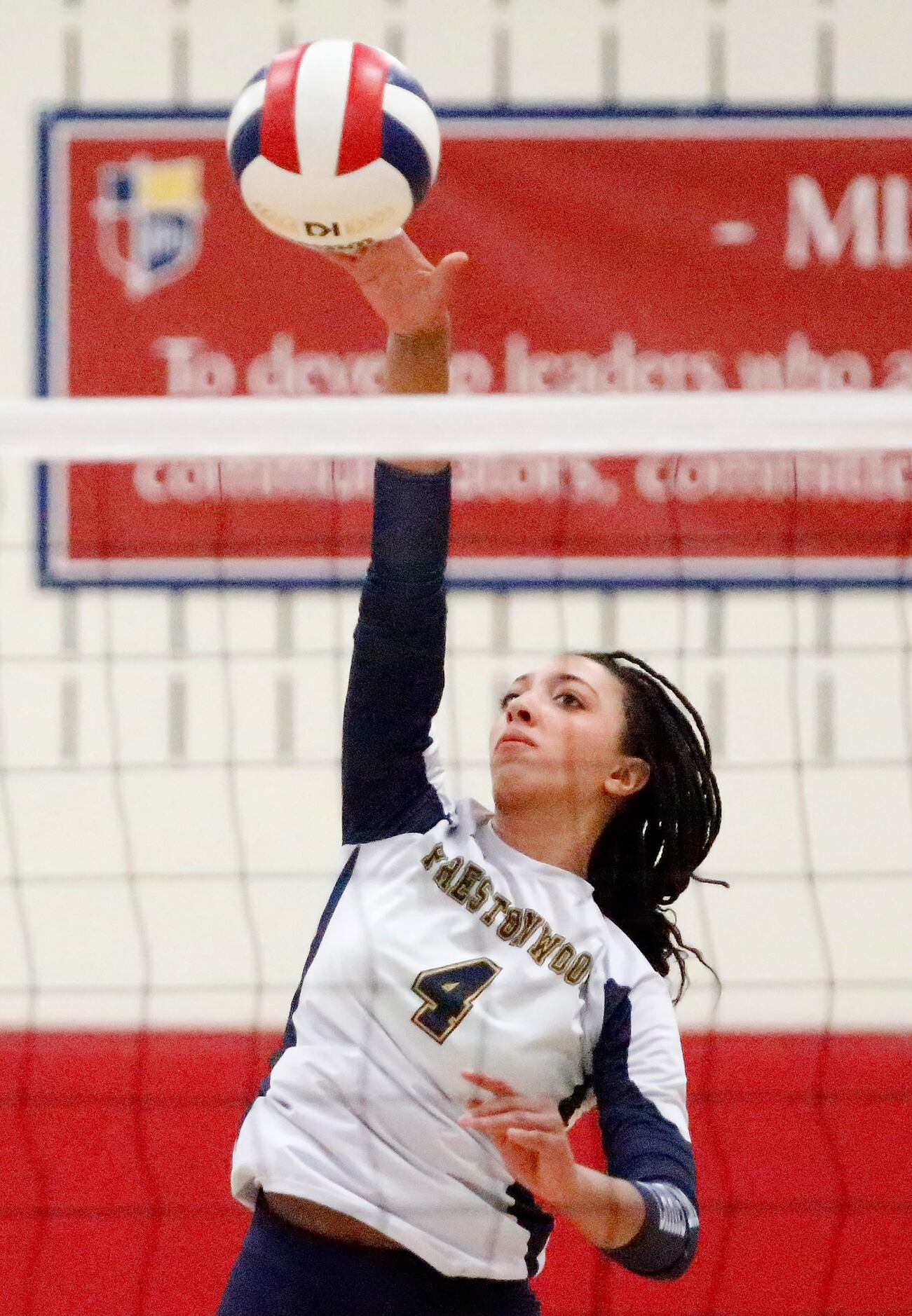 Prestonwood Christian Academy outside hitter Jadyn Livings (4) hits the ball during game one...