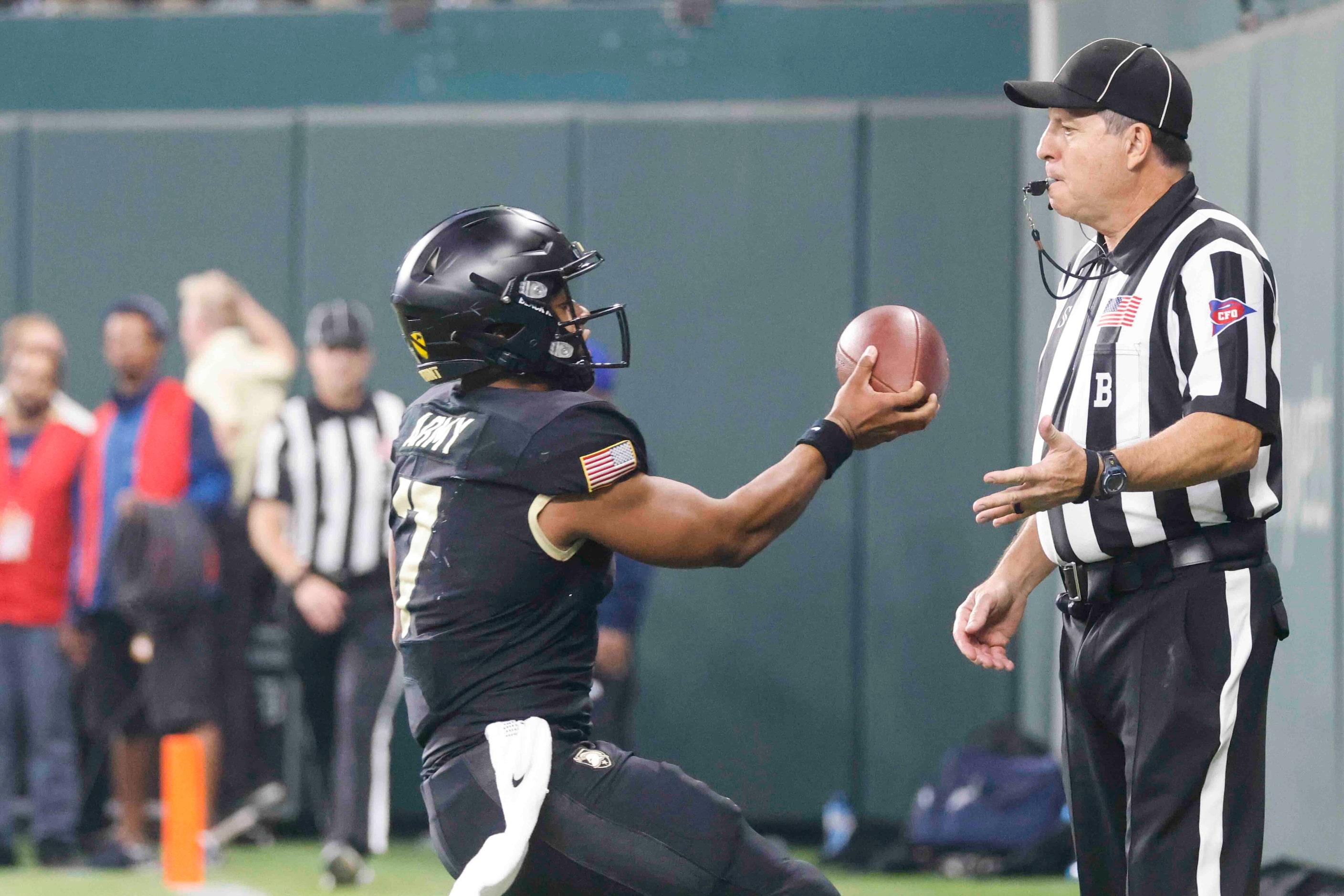 Army quarterback Jemel Jones (7) completes a touchdown against Air Force during the first...