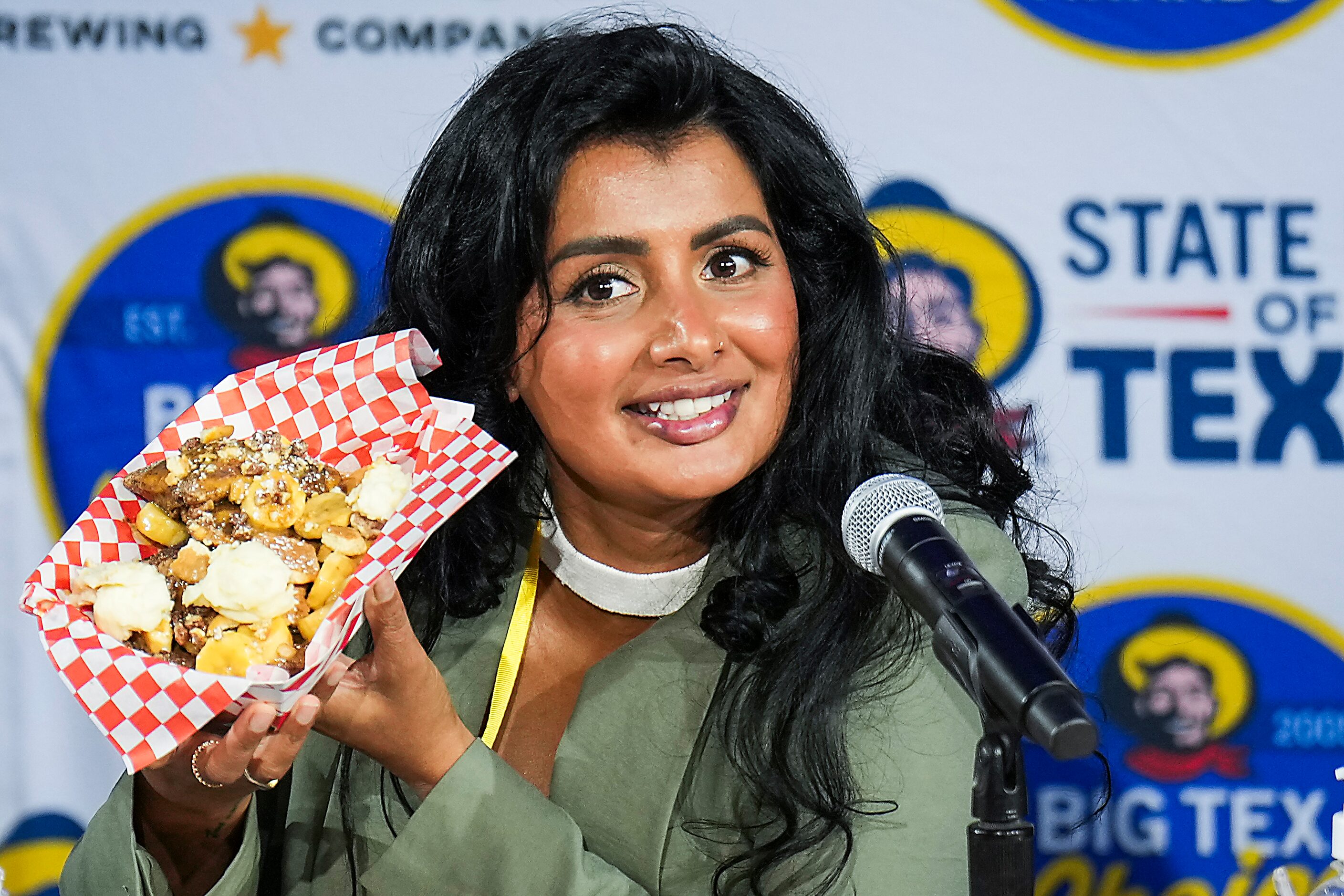 Judge Sumera Syed shows off Bourbon Banana Caramel Sopapillas by Lauren and Cody Hays, the...