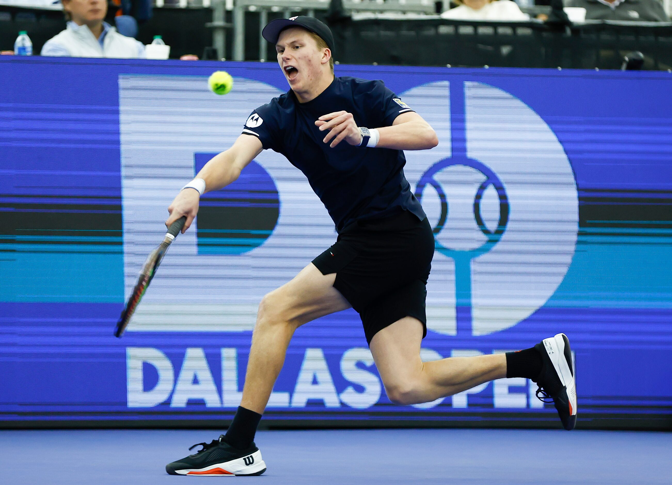 Jenson Brooksby returns the ball during the finals of the ATP Dallas Open against Reilly...