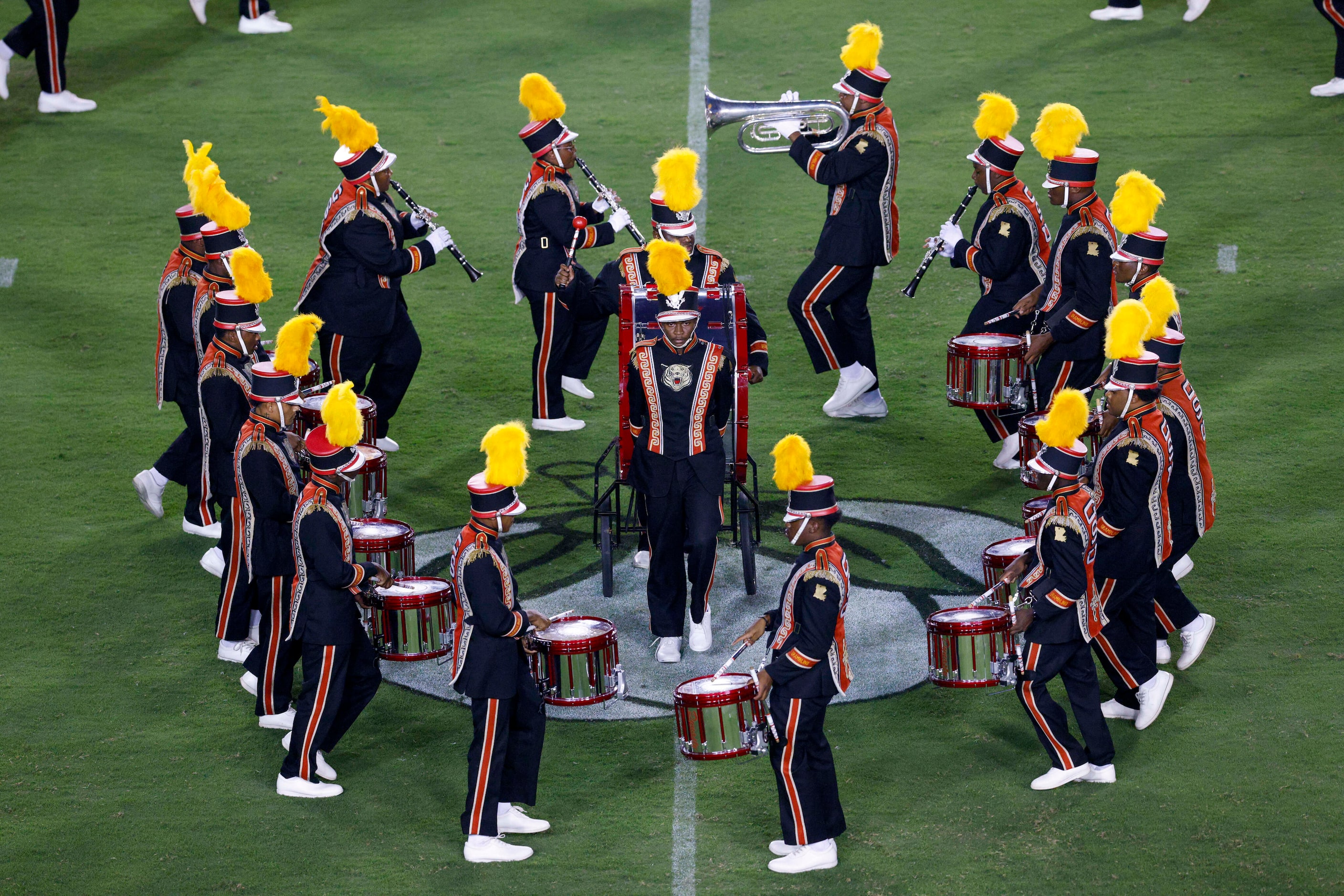 The Grambling State marching band performs during halftime of the State Fair Classic at the...