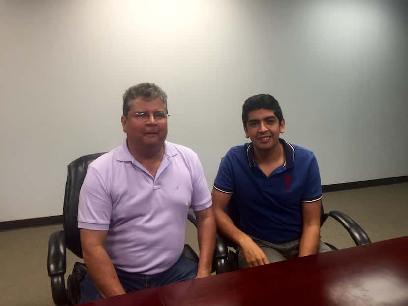 Clemente Gutierrez Castellanos, 50, and Clemente Gutierrez Jr., 20, wait at the Consulate...