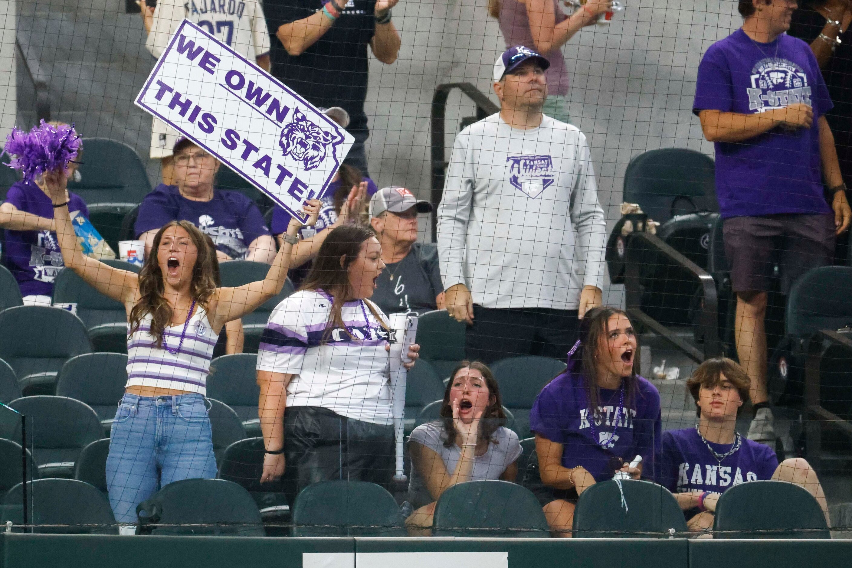 Fans cheer after a homer by Kansas St. infielder Kaelen Culpepper during the second inning...