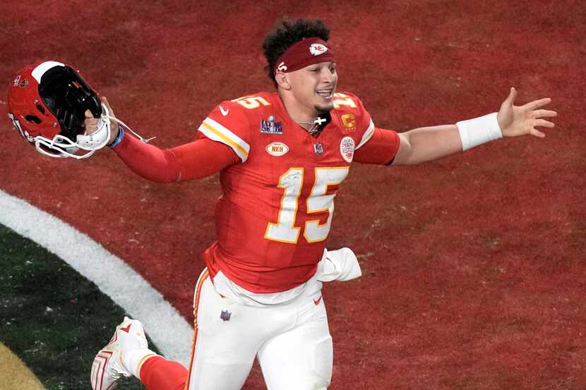 Kansas City Chiefs quarterback Patrick Mahomes (15) celebrates their win in overtime during...