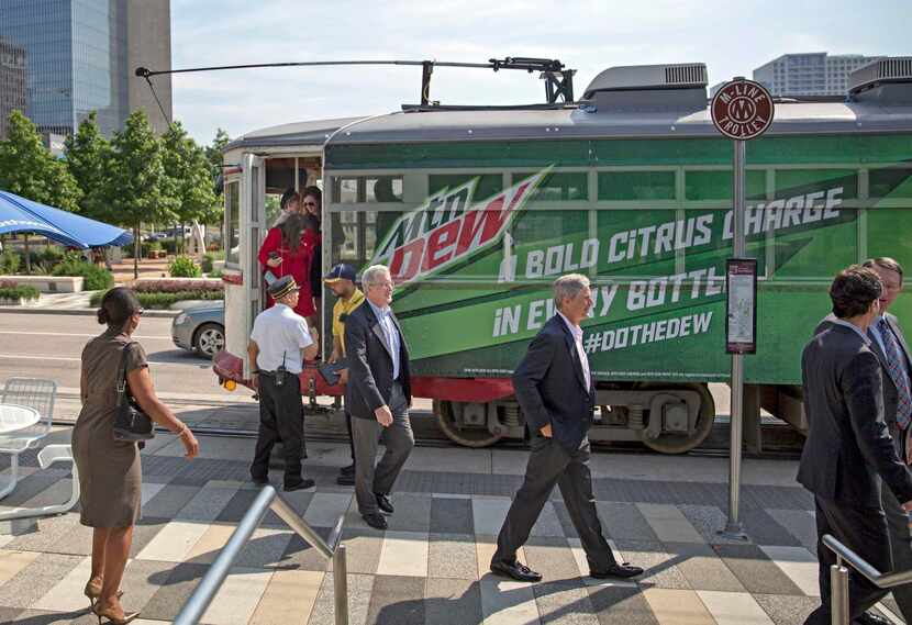 
Dallas officials rode the M-Line trolley to Klyde Warren Park on Friday. The M-Line...