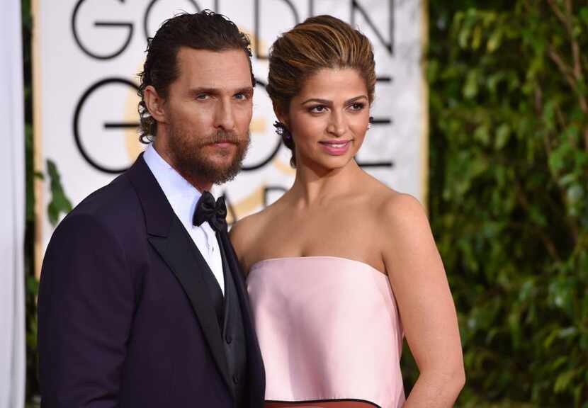 Matthew McConaughey, left, and Camila Alves arrive at the 72nd annual Golden Globe Awards at...