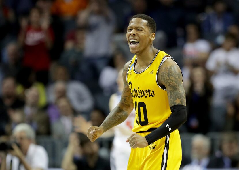 CHARLOTTE, NC - MARCH 16:  Jairus Lyles #10 of the UMBC Retrievers reacts after a score...