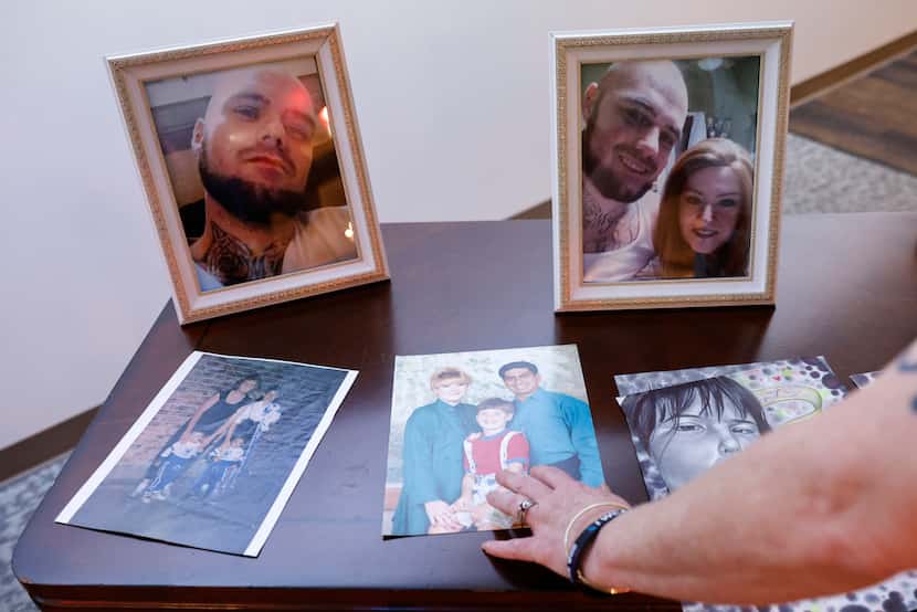 Tona Southards, mother of Jon Anthony Southards, arranges photos of her son ahead of Jon’s...