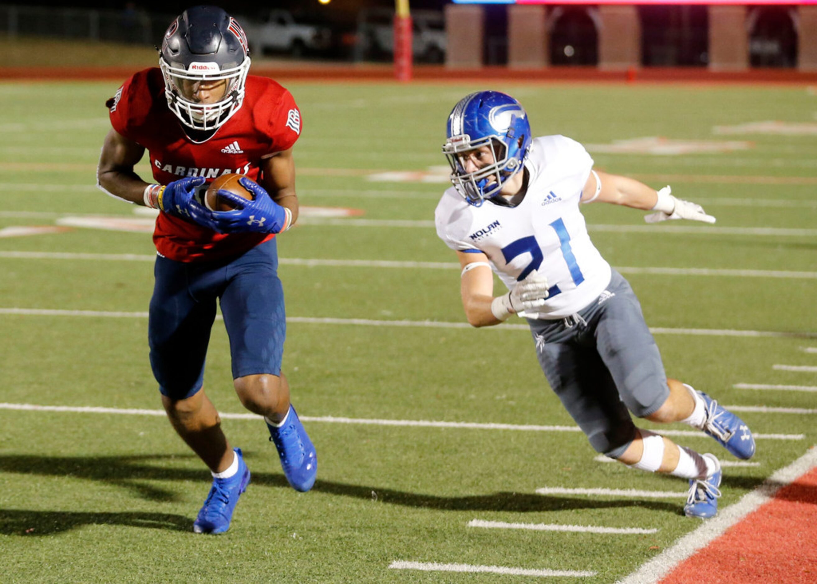 John Paul's Jerand Bradley (9) makes a reception and scores a touchdown as Nolan's Cael Ross...