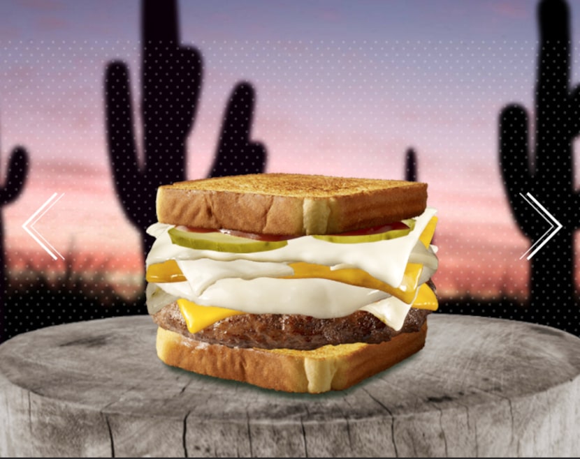 My Texas burger standing proudly in front of a field of Texas saguaros.