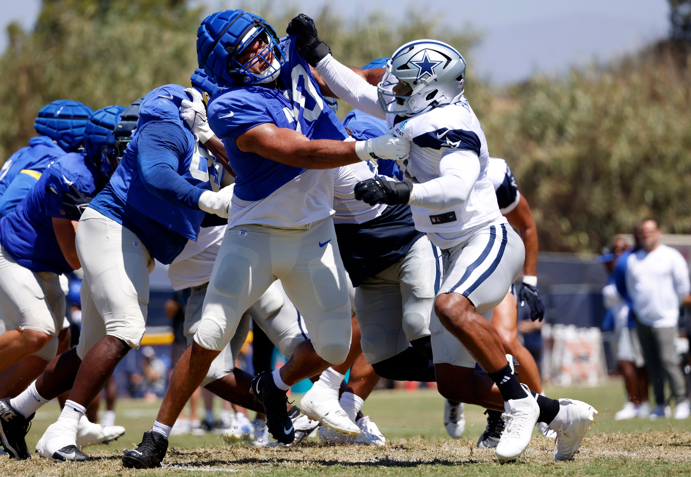 Dallas Cowboys linebacker Micah Parsons (11) tries to get around Los Angeles Rams offensive...