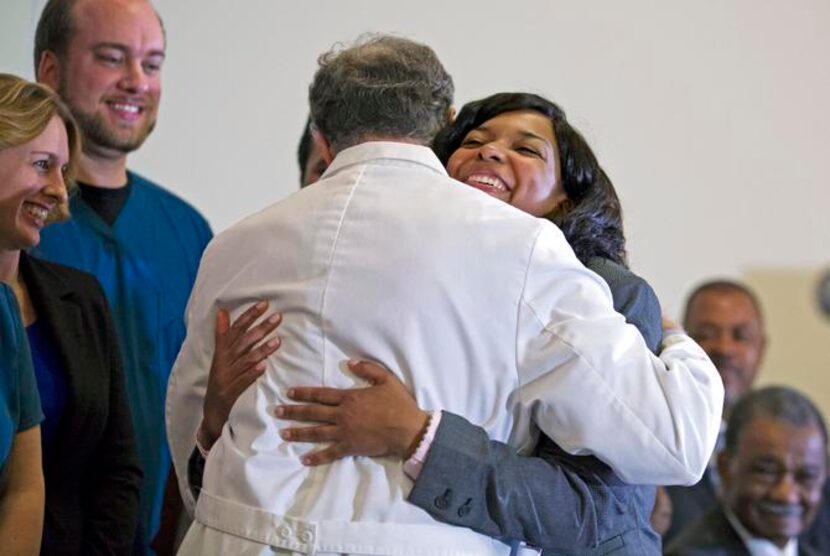 
Amber Vinson embraced Bruce Ribner, director of Emory University Hospital’s Serious...