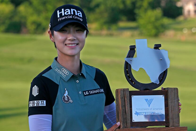 Sung Hyun Park, of South Korea, poses for a photograph wth the trophy after winning the...