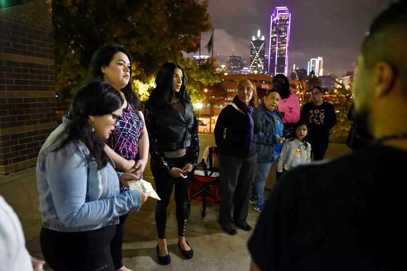 Angelica Andrade, far-left, of the North Texas Dream, speaks during a rally in support of...