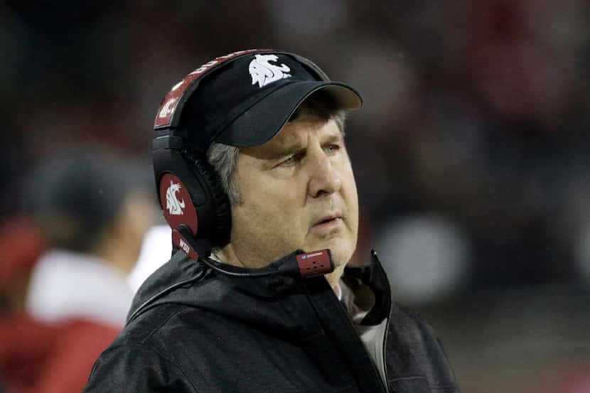 Washington State head coach Mike Leach looks on during the second half of an NCAA college...
