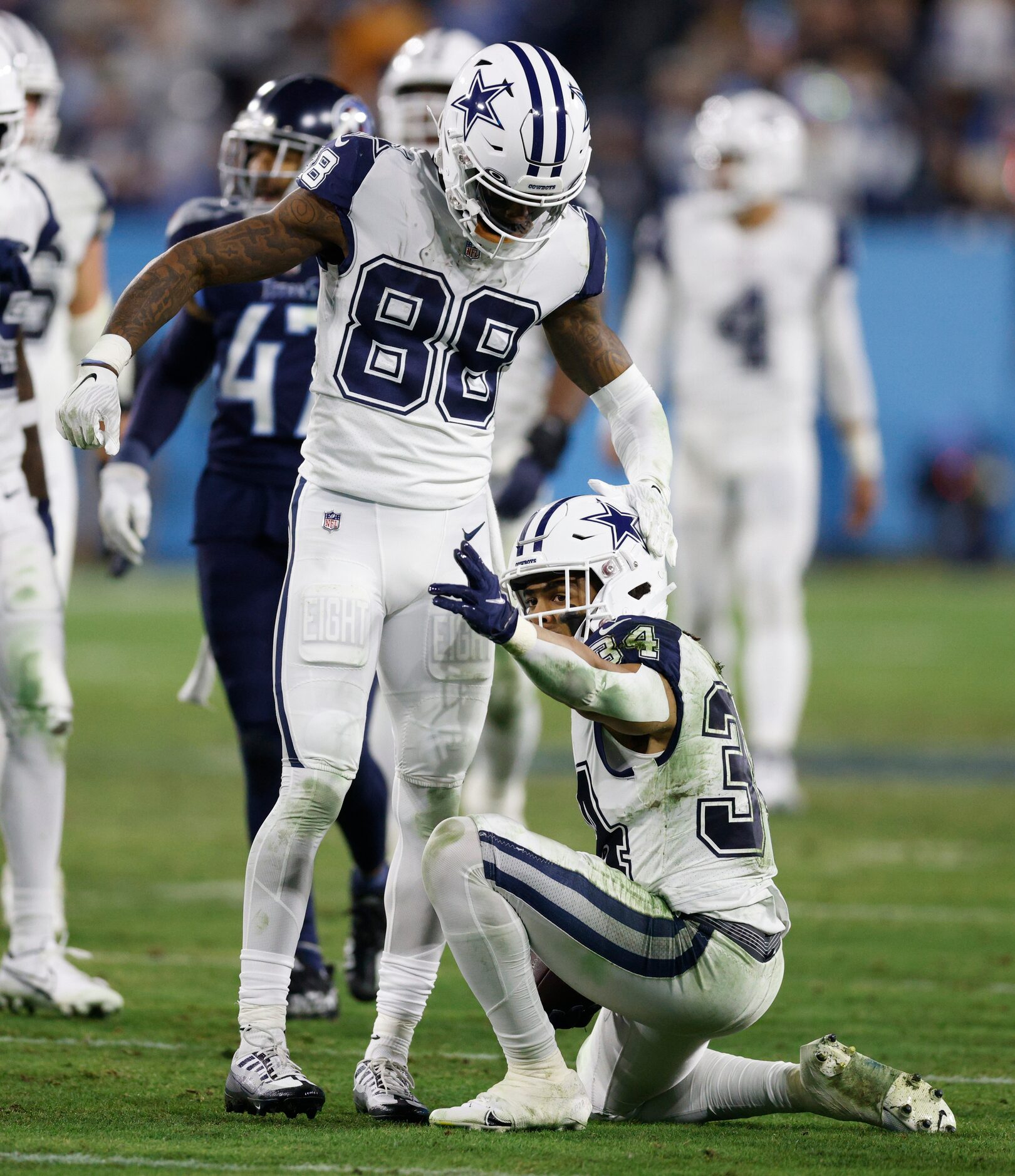 Dallas Cowboys running back Malik Davis (34) celebrates a first down with wide receiver...