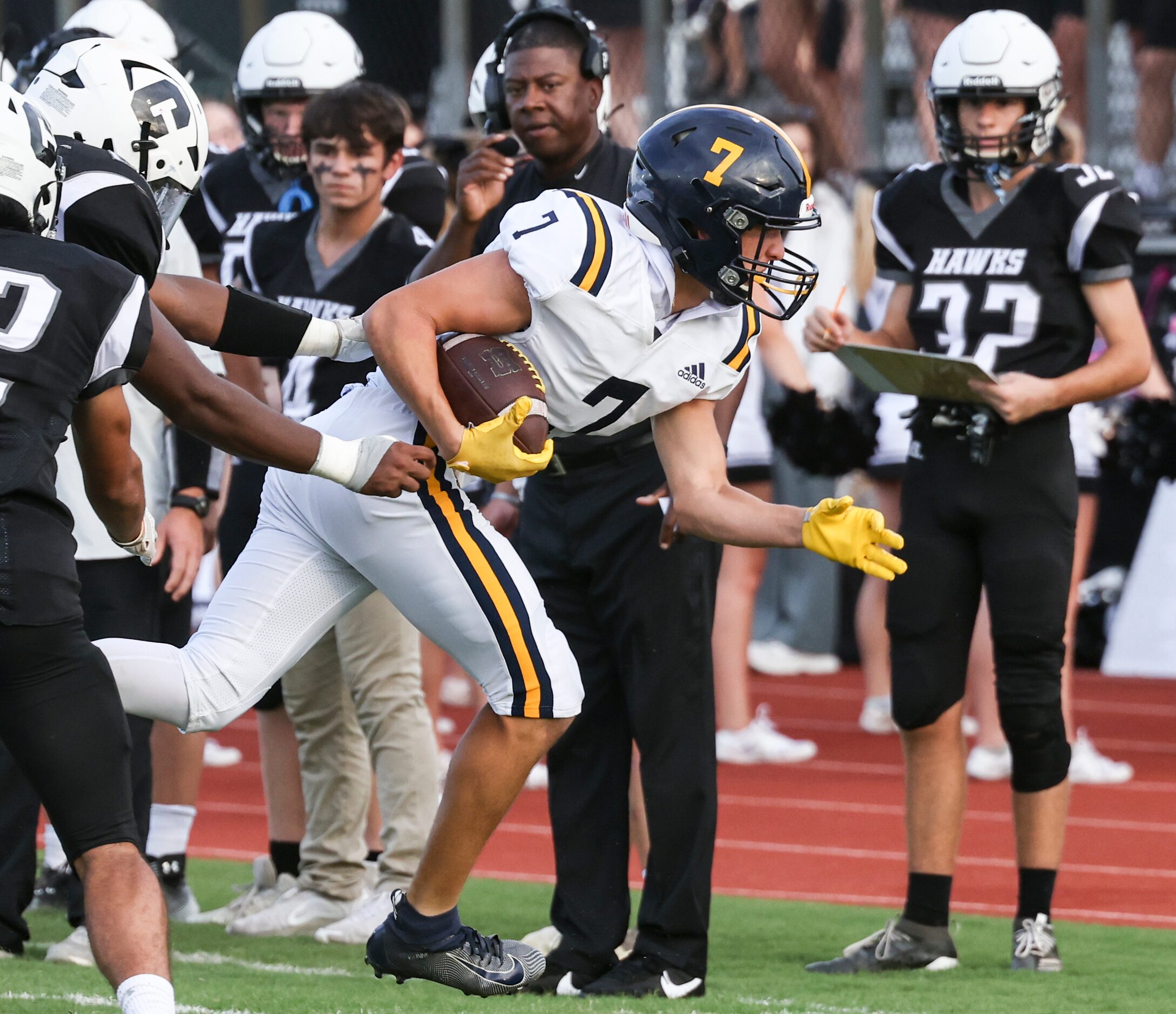 St. Mark's School of Texas Blake Malouf (7) gets pushed with the ball out of bounds during...