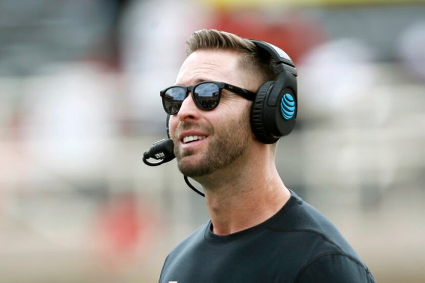 Texas Tech head coach Kliff Kingsbury watches an instant replay from the sidelines in the...