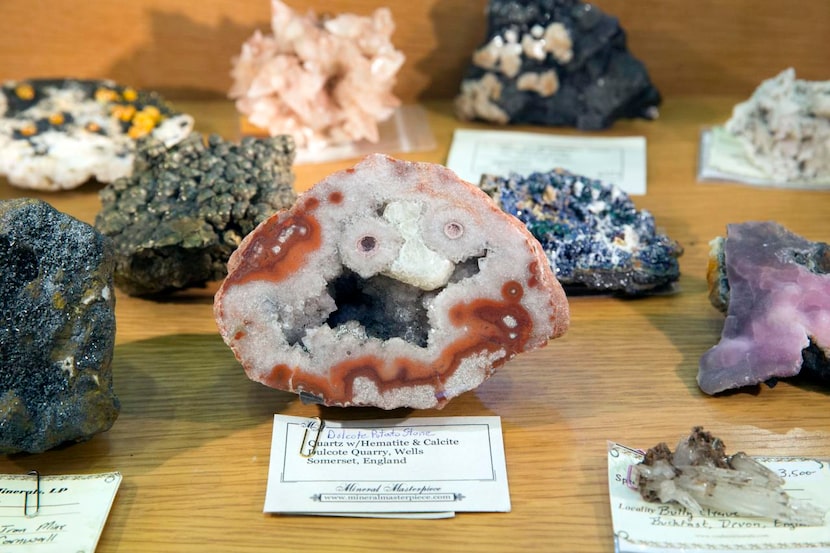 
The collection includes this quartz with hematite and calcite from the Dulcote Quarry in...