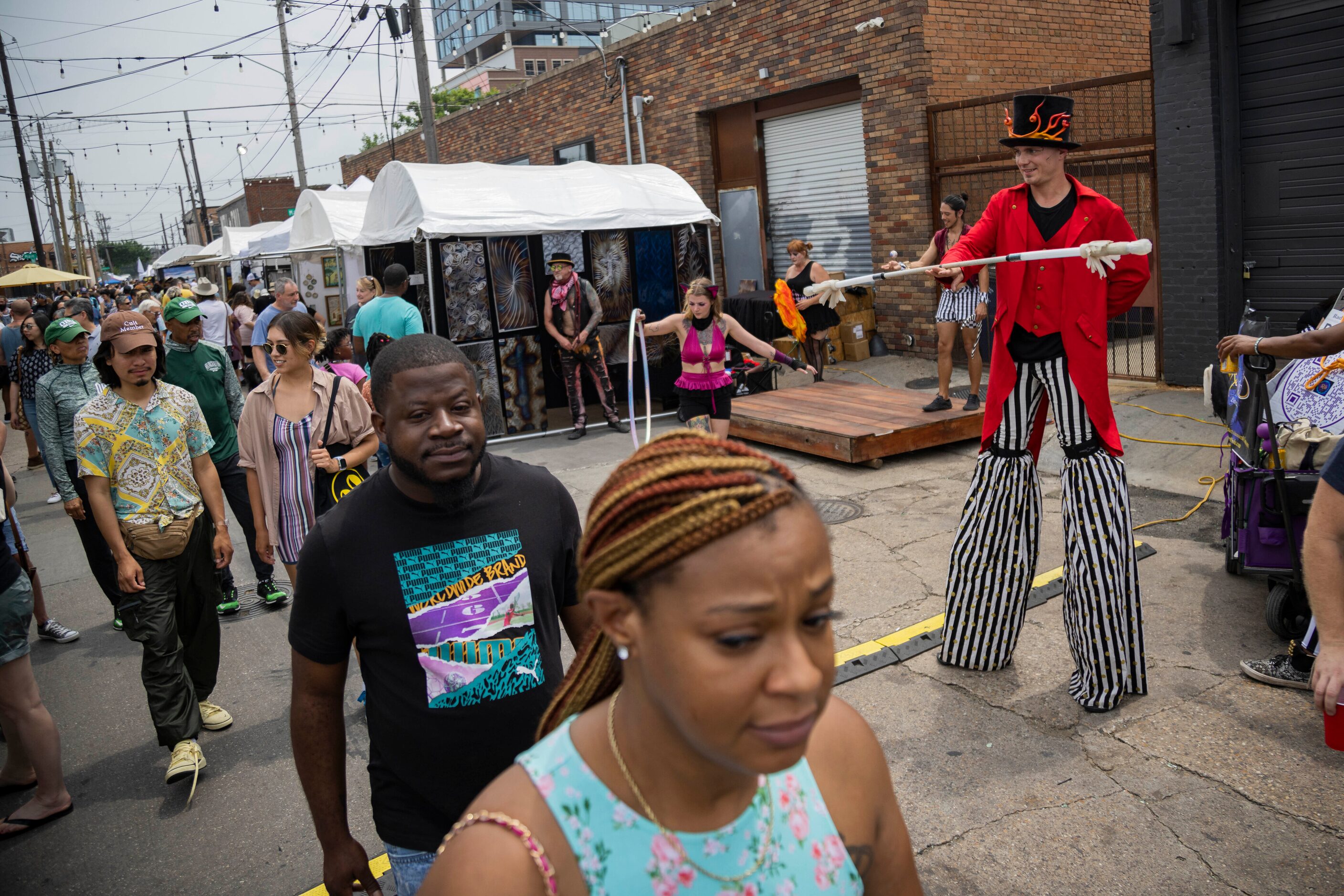 Alex Snyder with RadiantSolz Entertainment performs during the Deep Ellum Community Art Fair...